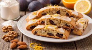 Nucatoli fatti in casa: biscotti ripieni di fichi, miele e frutta secca, con glassa profumata al limone